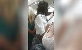 Having a back home trip, the naughty voyeur films, in full public, the massive boobs of the blonde slut who is next to him - amateur public erotic video