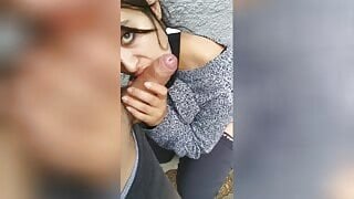 A brunette teen wearing a mask in public with big boobs and a huge butt is approached by a stranger in public POV and gives a blowjob.